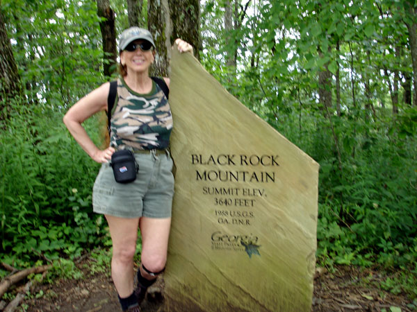 Karen Duquette at Black Rock Mountain sign